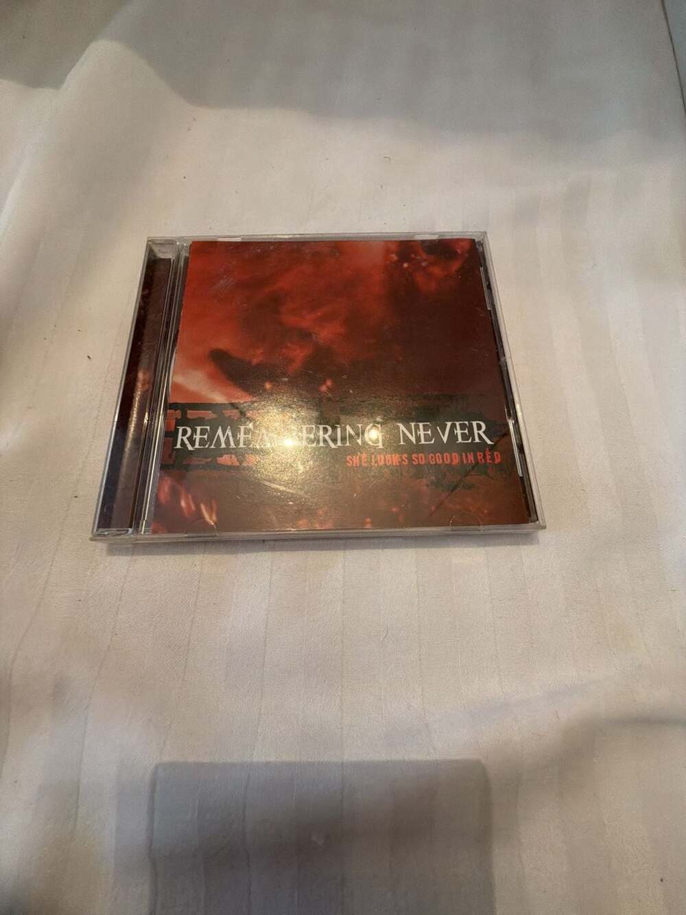 Remembering Never She Looks So Good In Red CD Album